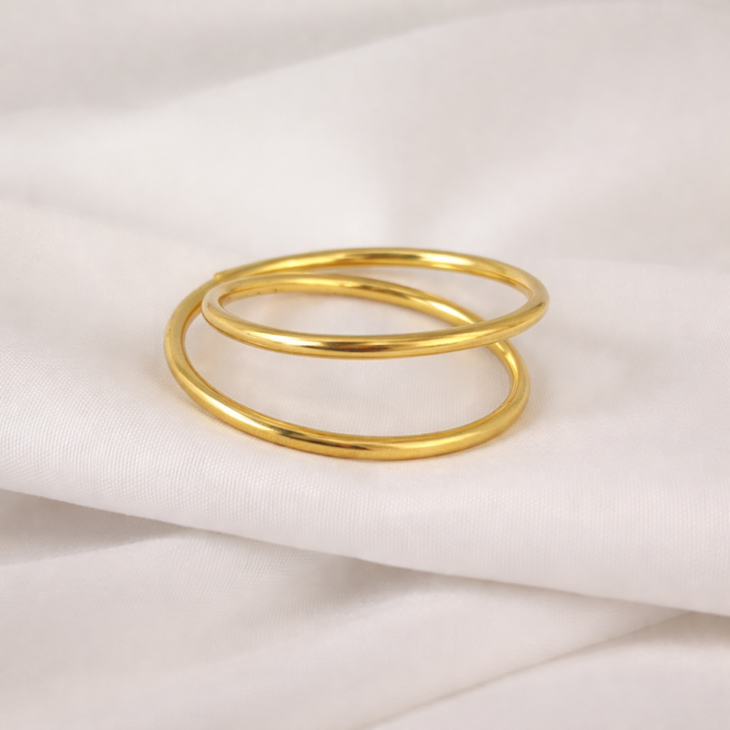 Anello portatovagliolo. Spirale dorata